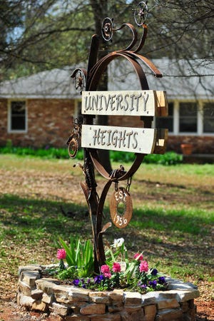 A new sign for the University Heights neighborhood sits at the corner of College Station Road and University Circle in Athens, Ga., Thursday, March 15, 2012. (AJ Reynolds/Staff andrew.reynolds@onlineathens.com)