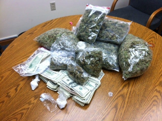Local police, after arresting a Milford man on marijuana charges, say they are looking for his roommate.