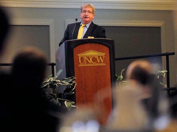 UNCW Professor of Economics Dr. William Hall speaks at the summit Going Downtown: To live, work and play at UNCW Thursday.