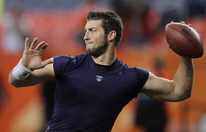 Barry Gutierrez Associated Press Broncos quarterback Tim Tebow warms up before a game against the Jets on Nov. 17 in Denver. Tebow was traded from the Broncos to the Jets on Wednesday.
