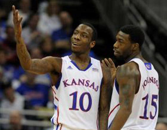 Kansas guards Tyshawn Johnson (10) and Elijah Johnson formed a special bond last summer during an especially difficult 30-day summer period in which they worked with former NBA guard John Lucas in Houston.