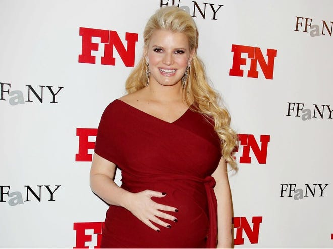 Singer Jessica Simpson poses at the 25th Annual Footwear News Achievement Awards on Nov. 29, 2011, at The Museum of Modern Art in New York. (AP Photo / Starpix, Amanda Schwab)