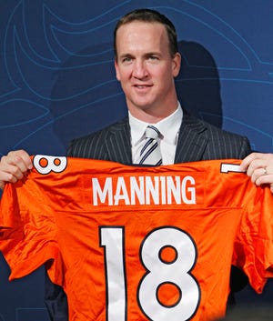 Peyton Manning signed with the Denver Broncos on Tuesday, a sight that would have bothered Jim Driver.