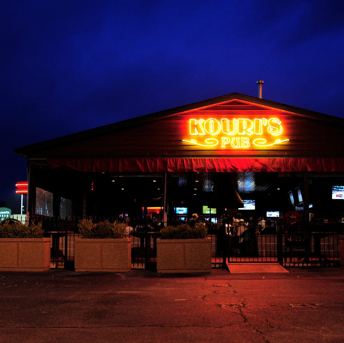 The beer garden of Kouri's Pub on Sterling Avenue has been ticketed for violating the smoking ordinance, but the pub's manager says they're within the law.
