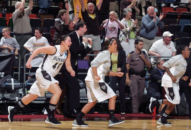 St. Bonaventure's Jennie Ashton, left, Ashley Zahn and Tatiana Wilson run onto the court to celebrate after an NCAA tournament second-round women's college basketball game against Marist on Tuesday, March 20, 2012, in Tallahassee, Fla. St. Bonaventure beat Marist 66-63.
