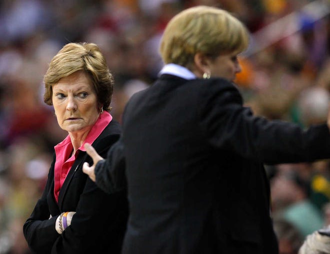 Tennessee coach Pat Summitt (left) saw her team eliminated on Monday night. The coach has yet to say if she'll return for a 39th year. Summitt is battling early onset dementia.