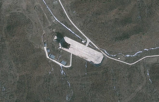 A satellite launch pad in Tongchang-ri, Cholsan County, North Pyongan Province, North Korea, is shown.  The Tongchang-ri site is about 35 miles (56 kilometers) from the Chinese border city of Dandong, across the Yalu River from North Korea. North Korea has moved a long-range rocket to its northwestern launch site in preparation for a launch next month, South Korean officials said Sunday March 25, 2012. North Korea says it will launch a satellite into space on a long-range rocket around the April 15 (AP Photo/GeoEye) MANDATORY CREDIT