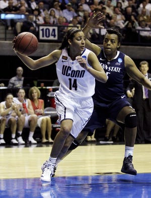 Penn State’s Talia East, right, defends against UConn’s Bria Hartley on Sunday during the second half of the Huskies’ 77-59 win in the NCAA regional semifinals in Kingston, R.I.