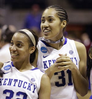 Norwich Free Academy grad Kastine Evans, right, and Kentucky teammate Samantha Drake smile as they walk off the court Sunday after their 79-62 NCAA regional semifinal win over Gonzaga in Kingston, R.I.