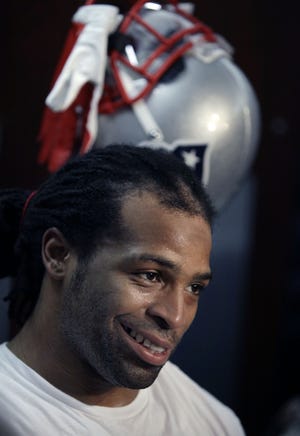 New England Patriots running back BenJarvus Green-Ellis speaks to reporters at his locker after NFL football practice in Foxborough, Mass., Friday, Jan. 27, 2012. The Patriots are scheduled to face the New York Giants in Super Bowl XLVI on Feb. 5 in Indianapolis. (AP Photo/Elise Amendola)