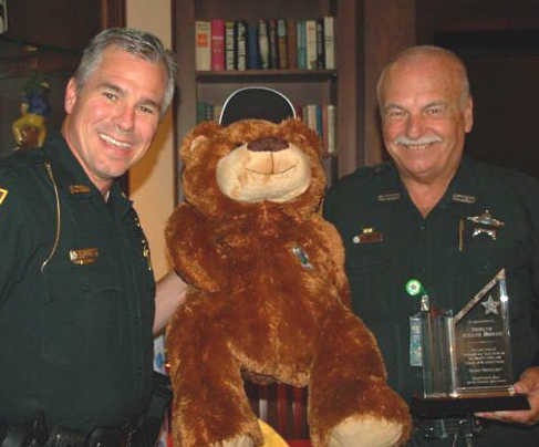 Bowen retires: St. Johns County Sheriff's Deputy Joe Bowen was honored by his coworkers at a special luncheon upon his retirement from the department after 46 years in law enforcement. In recent years Bowen was best known as Deputy Joe, as he delivered stuffed animals and brought cheer to patients in area hospitals and residents of nursing and rehab facilities. He also authored the twice-monthly Ask Deputy Joe column which appears in The St. Augustine Record. Bowen is pictured here with Sgt. Charles Mulligan, from left; and Deputy Teddy Bear. Contributed photo. Contributed photo