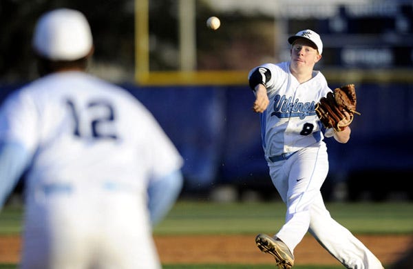 Hoggard second baseman Connor Autry throws to first base during the Vikings' 1-0 win against Laney on Tuesday night.