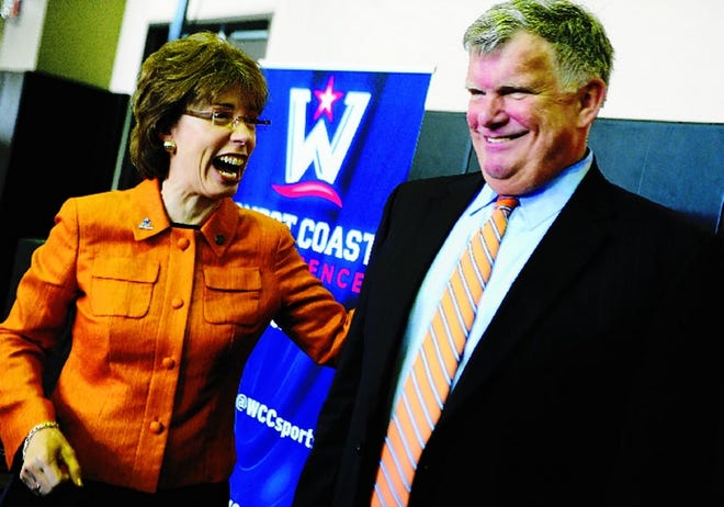 Pacific president Pamela Eibeck shares a laugh with athletic director Ted Leland following the news conference announcing that the university will become the 10th member of West Coast Conference. Pacific was a charter member of the West Coast Athletic Conference in 1952 before leaving in 1971 for what would eventually become the Big West.