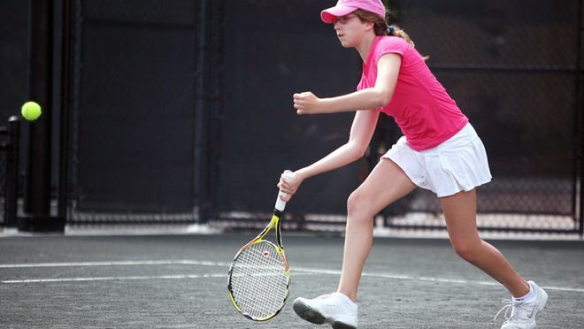 Sloane Sambuco, 12, of Palm Beach, plays in the Town of Palm Beach U.S.T.A. juniors' tournament Saturday at the Palm Beach Recreation Center. In the girls 12s division, Sambuco defeated Rachel Mikulinsky of Boca Raton 8-5.