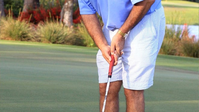 Peter Brown lines up a putt at the Israel Cancer Association inaugural Golf Clasic April 8 at the Banyan Golf Club.