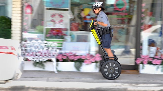 Officer Michele Pagan patrols South County Road Wednesday on the department’s first Segway.