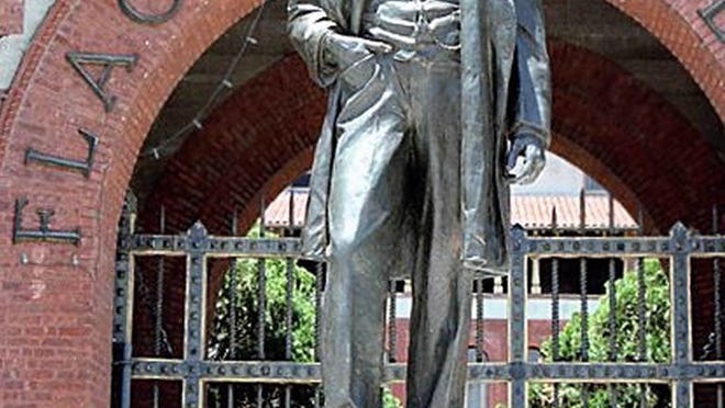 This 11-foot statue of Henry Flagler stands in St. Augustine at Flagler College. Town Council members have voted to put a replica just east of the Flagler Memorial Bridge.