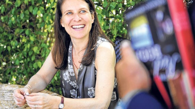 Author Deborah Kogan set her novel in 2009, the year she faced personal challenges including the death of a parent, financial struggles and a move.