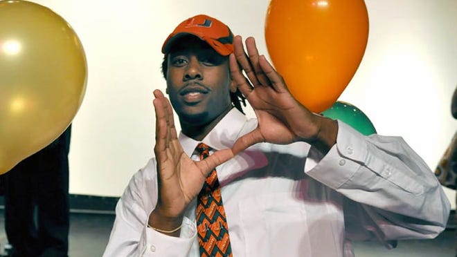 Clive Walford, shown on Feb. 3, 2010 after signing with the University of Miami, was offered a scholarship by the Hurricanes before playing a football game in high school.