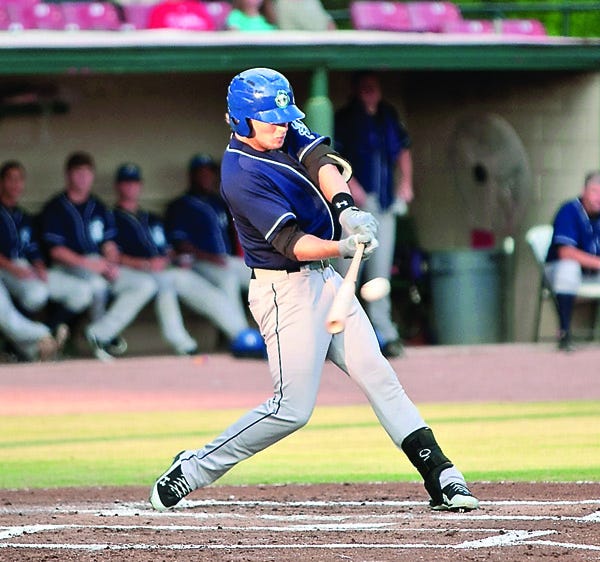 Kyle Parker hits in a 2011 game while playing for the Asheville Tourists. Record file photo