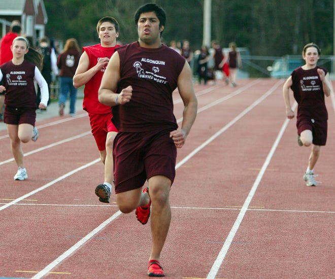 Westborough High School’s Nishont Joshi leads the pack in the 100-meter dash during yesterday’s integrated Special Olympics track meet.