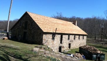 Submitted Photo - The restoration project replacing the grist mill roof at Waterloo Village was completed April 7.