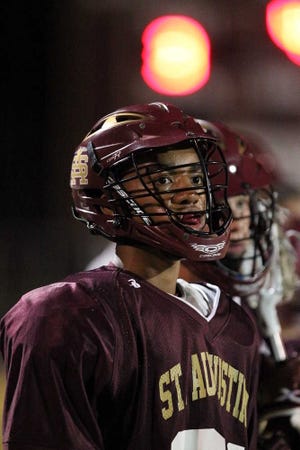 St. Augustine boys lacrosse player Dominique Herring-Ratcliffe looks on during a game this season. A season after going 0-8, the Yellow Jackets already have six wins heading into the District 6 tournament.