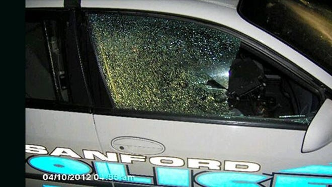 The Sanford police car that was riddled with bullets.
