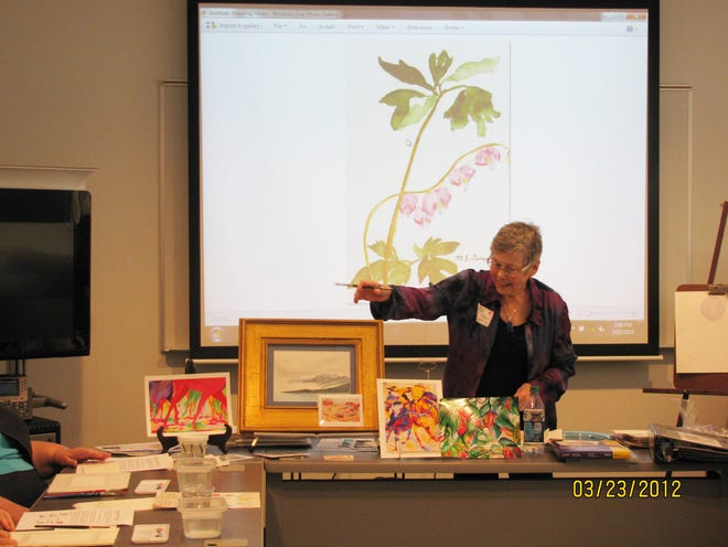 Retirees Leading Academy graduate Mary Ellen Carver presents a session on making watercolor greeting cards at the Retirement Leading Institute held recently in the Spoon River College Conference Center.