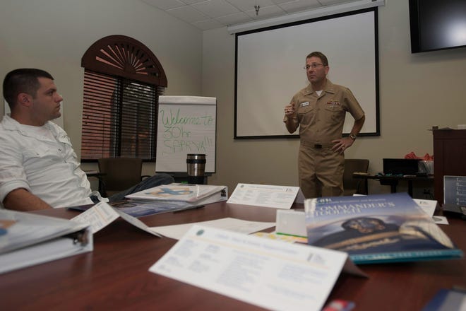 Rear Adm. Joseph Tofalo, commander, Submarine Group Ten, introduces the Sexual Assault Prevention and Response class April 9 at the NSB Kings Bay Fleet and Family Support Center. Students are all prospective command victim advocates.