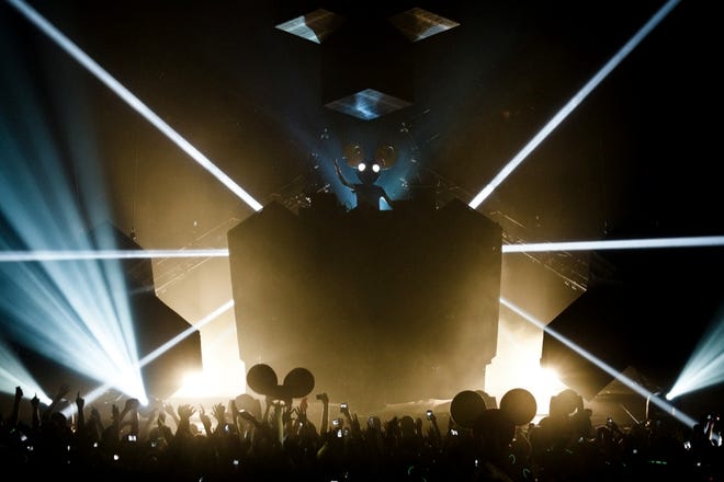 DEADMAU5 performs at a show in New York. With the growing popularity of electronic dance music, the concert industry has seen a boom in live DJ acts packing large venues. (CHAD BATKA | THE NEW YORK TIMES )