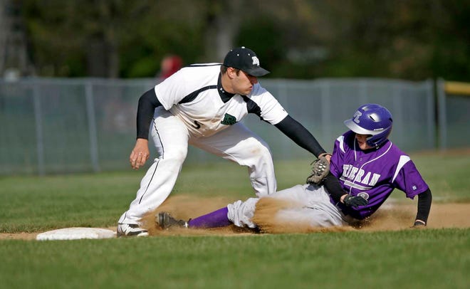 Lutheran High School's Danny Bartz (3) is tagged out at third by Rock Falls' Mitch Giddings (5) in the first inning Tuesday, April 10, 2012, at Lutheran in Rockford.