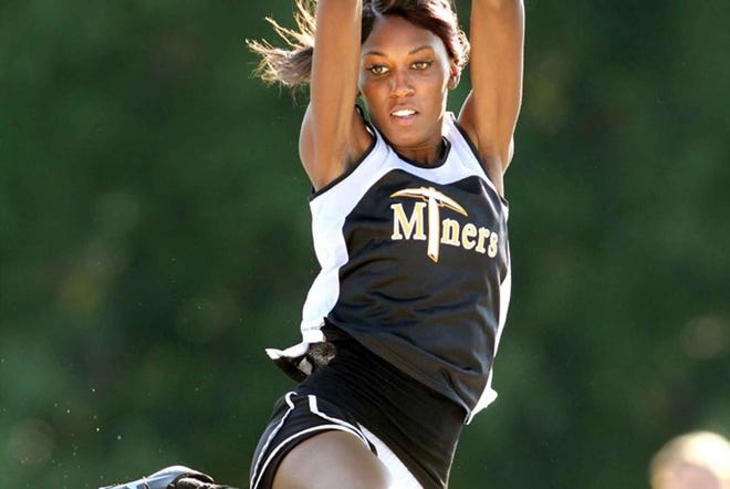 Fort Meade senior Kamesha Brown competes in the girls long jump during the Class 1A, District 9 meet at Teneroc.