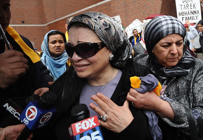 Souad Mehanna leaves U.S. District Court in Boston this afternoon after her son Tarek Mehanna, 29, of Sudbury, was sentenced to 17 years in prison for conspiring to help al-Qaida