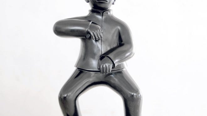 From Michael Goedhuis’ Chinese and contemporary art gallery comes Xie Aige’s 'Tai chi series, No. 7,’ a bronze from 2009, at a size of 23.6 by 15.7 by 8.7 inches.