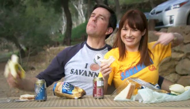 Andy and Erin in the awesome Savannah T-shirts from the episode "Welcome Party," which aired Thursday night on NBC.