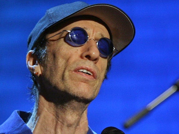 Robin Gibb performs during the "Jose Carreras Gala" rehearsal in Leipzig, eastern Germany, in this Dec. 14, 2006 file photo. The Sun newspaper reported Saturday April 15, 2012 that 62-year-old Gibb is in a coma, citing a family friend.