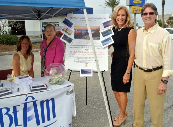 Photos by Jackie Rooney for Shorelines Ann Willis (from left) of First Coast Insurance collected donations for Beaches Emergency Assistance Ministry represented by Mary Jane Brown and BEAM board member Pam Almand. Sponsoring the event was Pam's husband Amos Almand, CEO of First Coast Insurance.