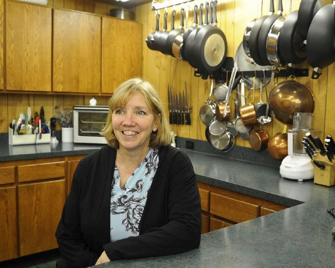 Pat McGrath, owner of Cooks Tour in Mountainhome, in the shop’s kitchen area, where cooking classes are held and shoppers can also try out products before they buy them.