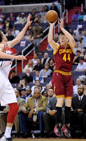Cleveland forward Luke Harangody shoots over Washington Wizards forward Jan Vesely during the first half of Saturday night's game in Washington. Harangody scored a team-high 16 points and the Cavaliers won 98-89.