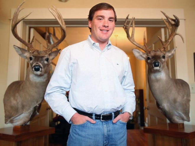 T.J. Bunn has some trophy deer mounts, among other trophies, in his Tuscaloosa office. Bunn is a new member of the Conservation Advisory Board.