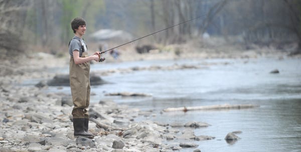 Zack Gleason, 14, of East Stroudsburg, was fishing for trout with his dad, Tim, on Brodhead Creek off Mill Creek Road, East Stroudsburg, on Sunday. Zack has been fishing for years and enjoys all types of fishing, especially for bass. Saturday was the first day of trout season.