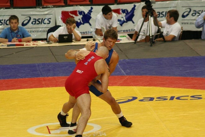 Chad Vandiver (facing) takes on Matt Holt in the 2011 World Team Trials in Oklahoma City.