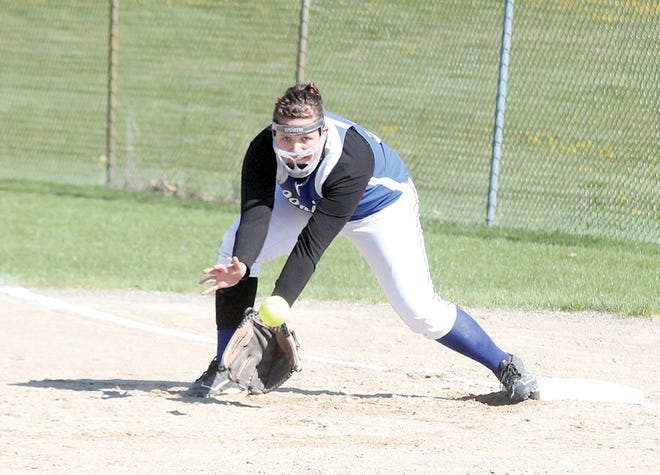Ionia first baseman Kelbie Stout grabs a throw for an out Tuesday afternoon during the Bulldogs’ first game of their doubleheader against Lansing Eastern.