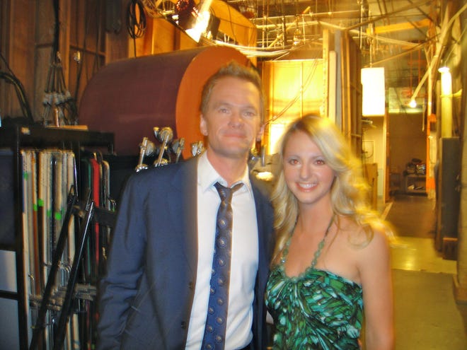 Galesburg's Shannon Stacey poses for a photo with "How I Met Your Mother" star Neil Patrick Harris. Stacey appeared as his girlfriend in the episode "Trilogy Time."