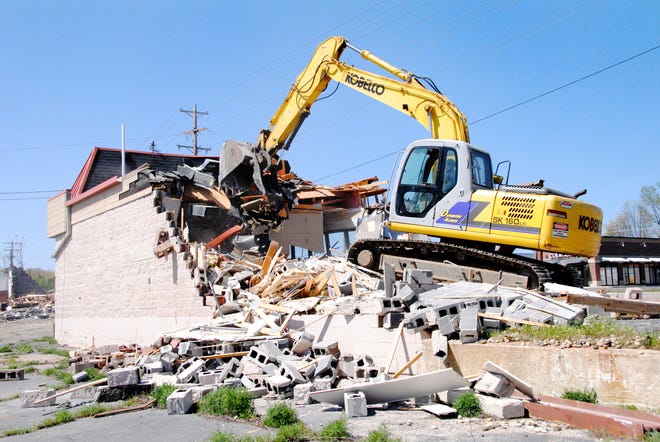 The old Sheldon Cleaners on Douglas and River was demolished on April 17, 2012.