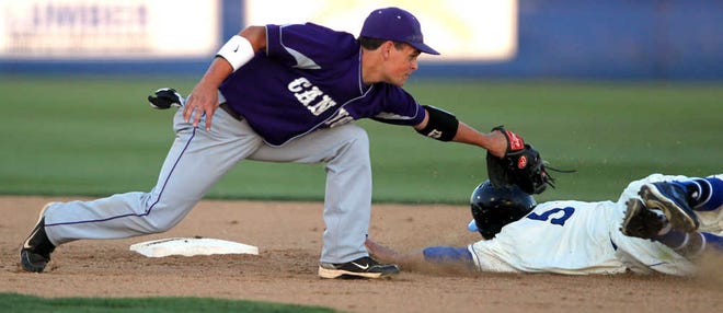 Frenship's Hunter Douglas steals second under the glove of Canyon's Colton Baker during their District 3-4A game on Friday at Frenship. Canyon won, 7-1.