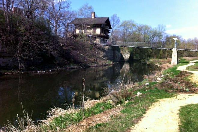Volunteers are being sought to clean up along Kent Creek on the grounds of Tinker Swiss Cottage Museum & Gardens on Sunday, April 22, 2012.