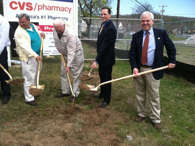 Ledyard Mayor John Rodolico, right, leads a Thursday groundbreaking ceremony for a new CVS pharmacy in Gales Ferry. Behind Rodolico from left to right are Economic Development Commission member Dick Tashea, former mayor Fred Allyn Jr., and state Rep. Tom Reynolds, D-Ledyard.
