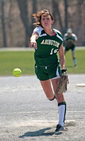 Abington High School's Kelly Norton delivers a pitch during the Green Wave's 9-0 softball victory over Plymouth South on Monday.